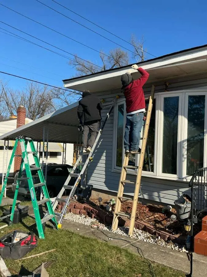 Restoration crew performing exterior repair in Port Jervis